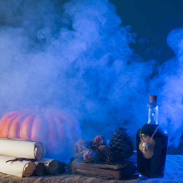 istock Group Of Halloween Objects Under Blue Fantastic Smoky Atmosphere 614738102