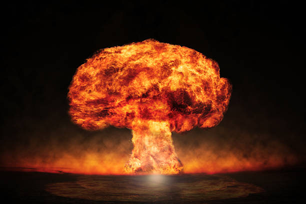esplosione nucleare in un ambiente esterno. simbolo dell'ambiente - judgement day sky burning red foto e immagini stock