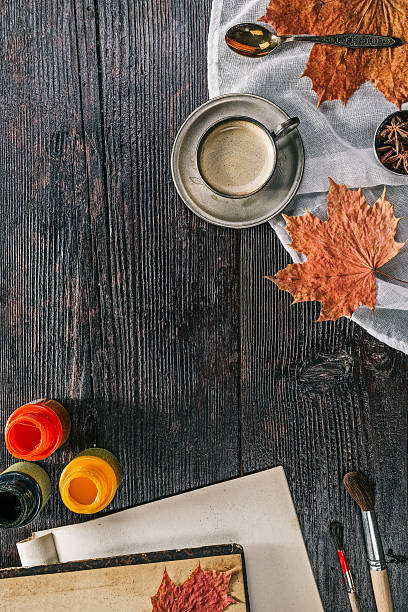 istock Still life with coffee cups and paints 614741230