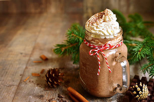 hot chocolate with wipped cream in a mason jar. - wipped cream imagens e fotografias de stock