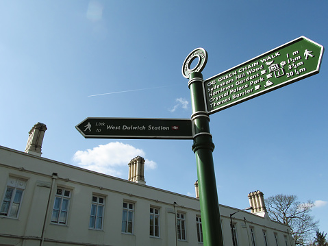 London, UK - 09th April 2014: Directions sign at Dulwich Picture Gallery. National Rail logo is also shown in the image
