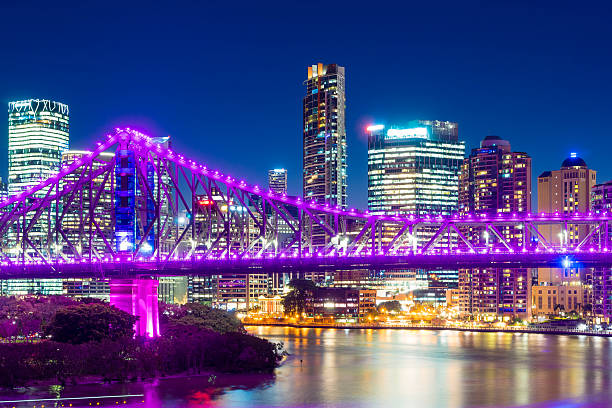 istock Illuminated bridge and skyscrapers in Brisbane at twilight 614745714