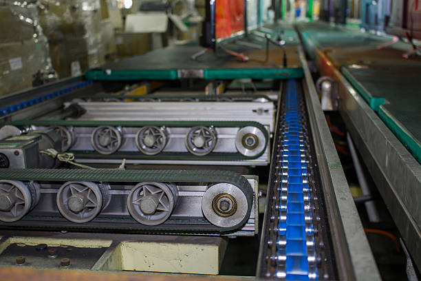 istock The chain and shaft drive Line Conveyor 614745742