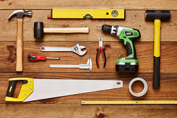 istock Hand tools are arranged on wooden floor - Knolling 614746100