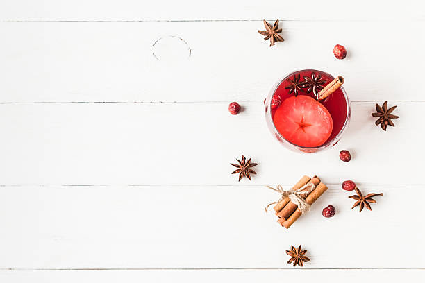 istock Christmas drink. Traditional mulled wine with spices. Flat lay 614746236
