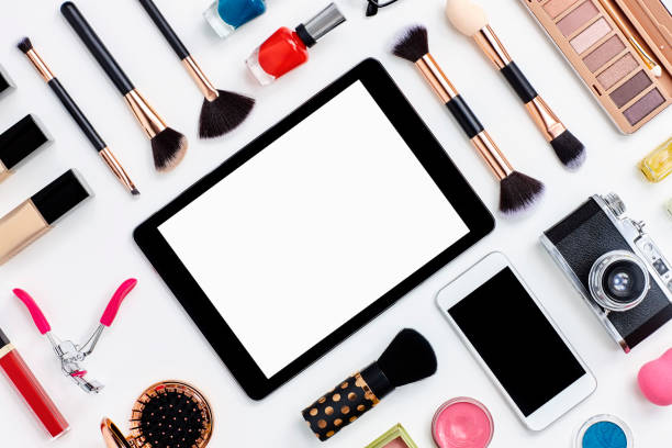 istock Beauty products surrounding digital tablet on white background 614746294