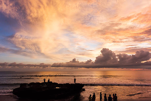 People watching the sunset in Canggu, Bali, Indonesia
