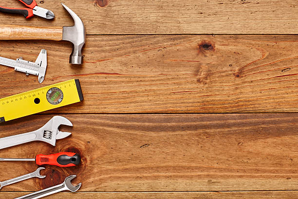 istock Carious DIY tools arranged on left side of wooden floor 614748936