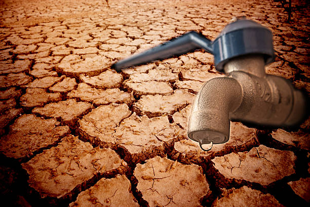 Drop of water focus, drought ground.
