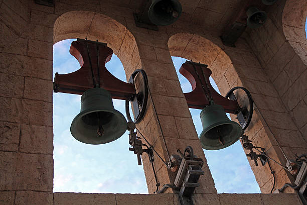 Two bells in the arched window in Fuerteventura stock photo