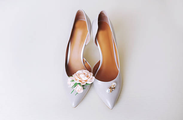 istock Female wedding footwear isolated over white background 614833794