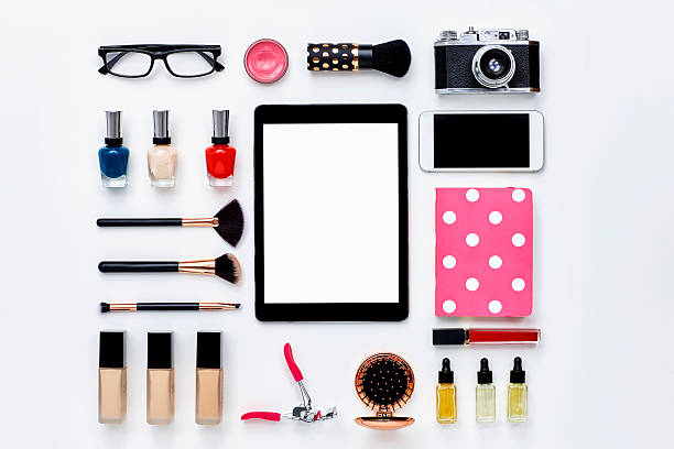 istock Digital tablet surrounded with blogger beauty products - knolling concept 614834586
