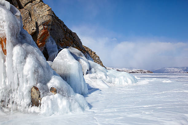 istock Rocks covered by ice on winter siberian Baikail lake 614835414