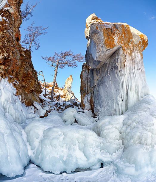istock Rocks covered by icicles on winter siberian Baikail lake 614835558