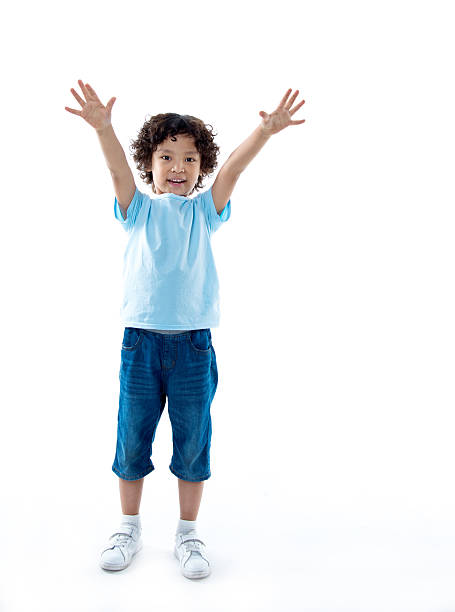 istock Little boy outstretching his arms 614839428