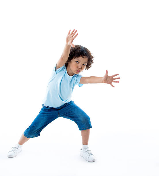 istock Little boy outstretching his arms 614839584