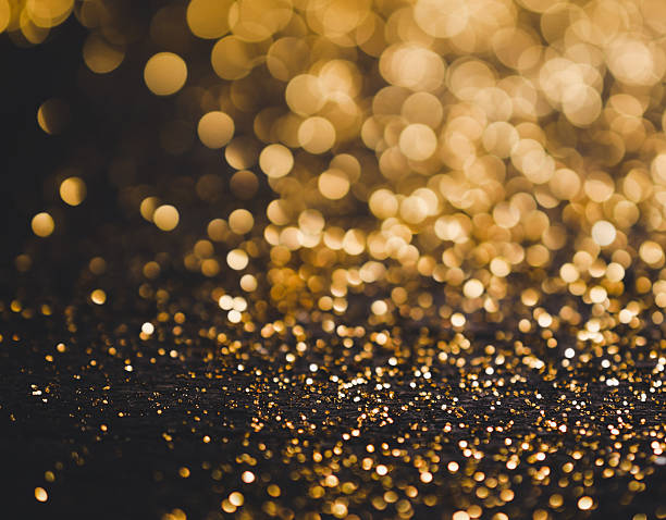 istock glitter bokeh lights bokeh defocused background 614841118