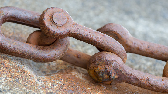 Old chain with rust, steel chain link fence
