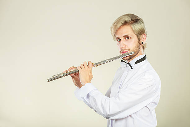 istock Flute music playing flutist musician performer 614841796