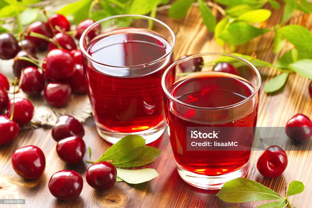 Cherry juice with fresh berries Cherry Stock Photo