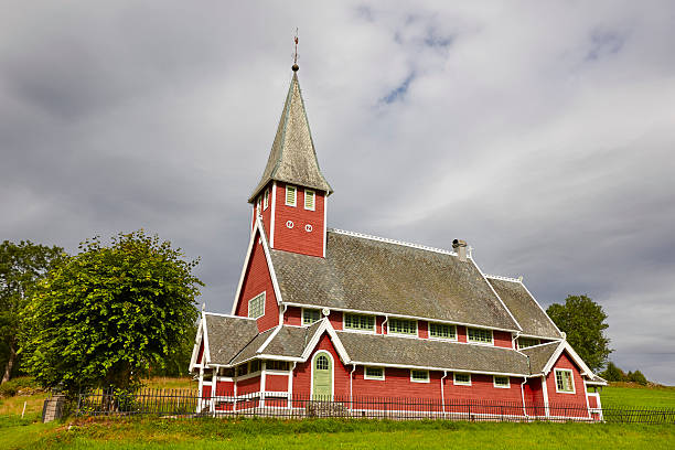 traditional norwegian red stave church. rodven. travel norway. - stavkyrkje imagens e fotografias de stock