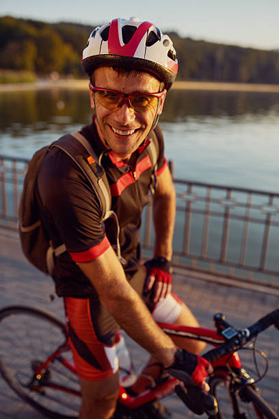 istock Young and energetic cyclist in the park 614844380