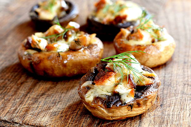 istock Mushroom caps stuffed with cheese and meat 614845308