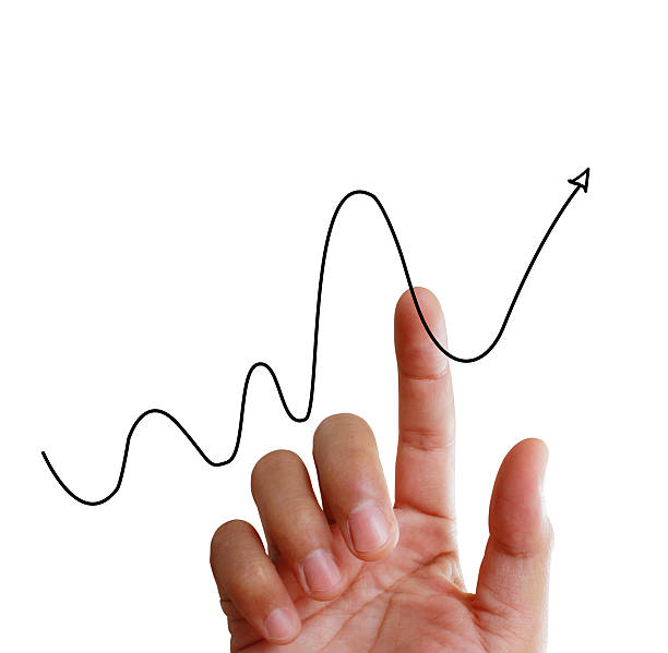 istock financial symbols coming from hand 614845488