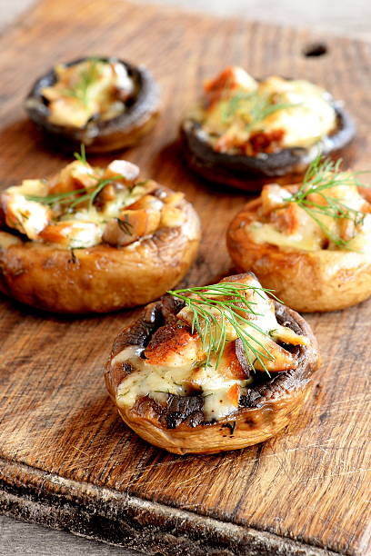 istock Stuffed mushrooms with cheese and fried meat 614845578