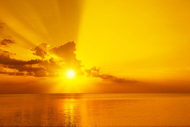 istock Magic golden sunset over sea 614849648