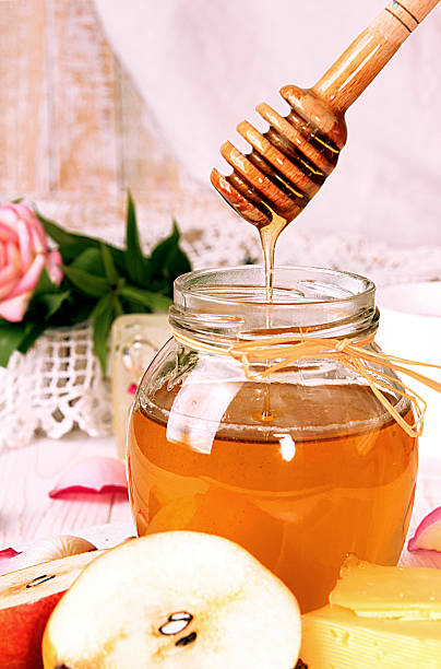 istock Breakfast with delicious sweet honey, tea, cheese and pear 614849704