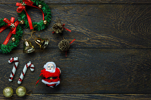 istock Top view Christmas decoration and Santa Claus doll . 614850180