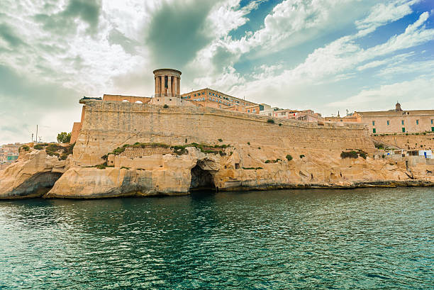 istock beautiful view of Valletta fort wall from water 614851690