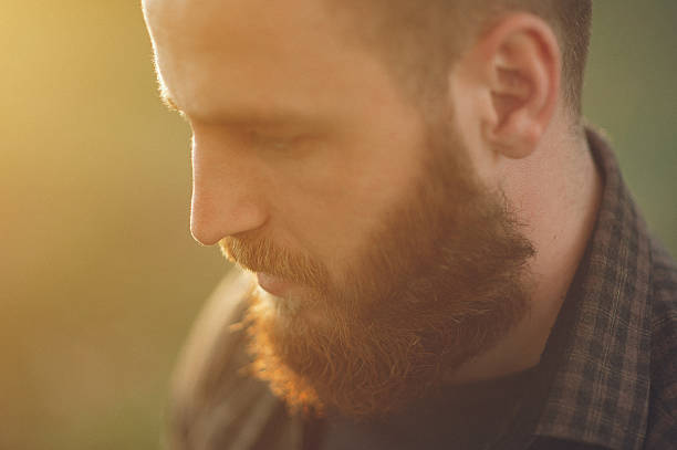 istock portrait of a handsome young man with a beard 614854472