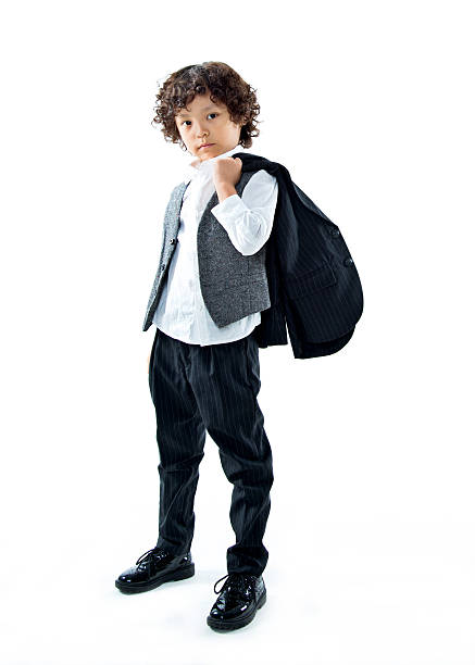 istock Little business child smiling isolated on white background 614855422