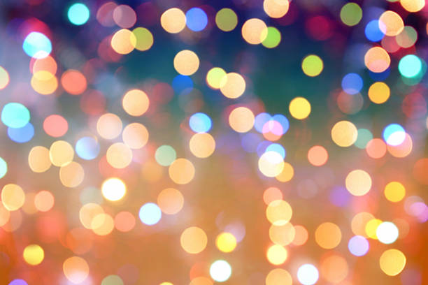 istock colorful abstract background blur motion with bokeh light 614856154