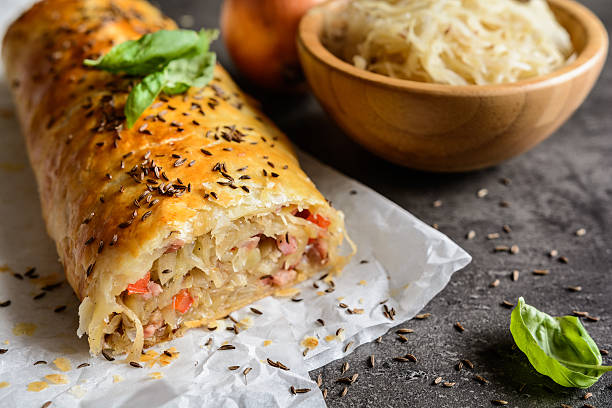 istock Savory strudel with sour cabbage, bacon and onion 614856946