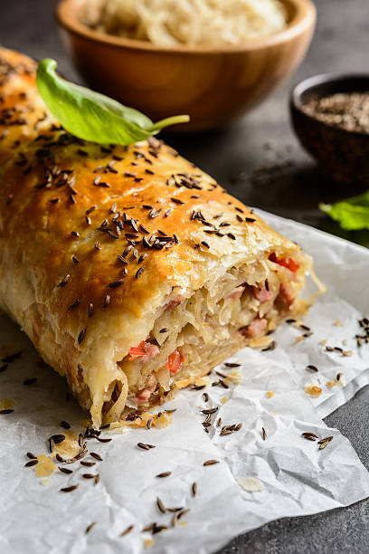 istock Savory strudel with sour cabbage, bacon and onion 614857002