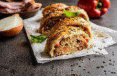 Savory strudel with sour cabbage, bacon and onion