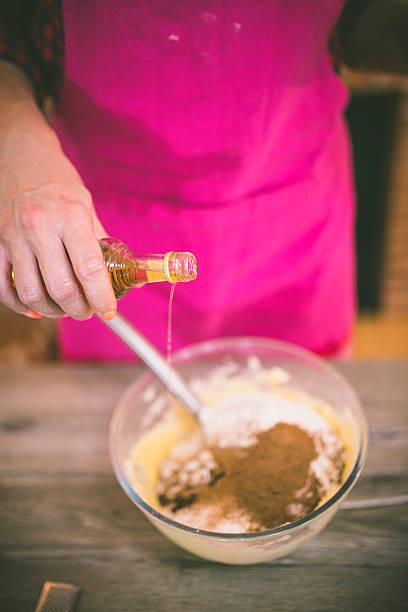 istock woman making gingerbread and cookies 614857522