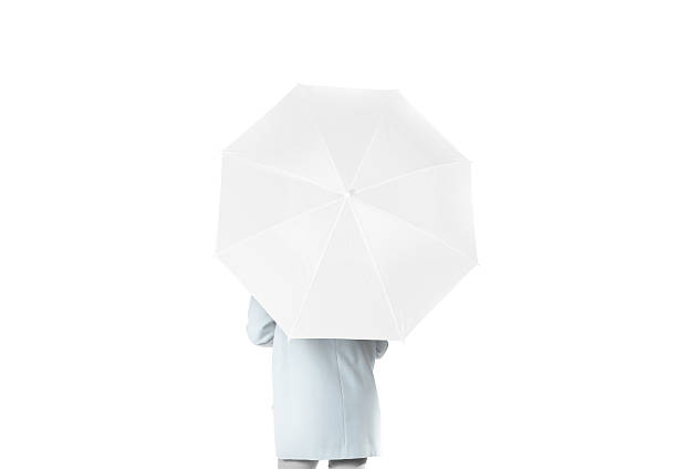 istock Women stand backwards with white blank umbrella opened mockup 614858898