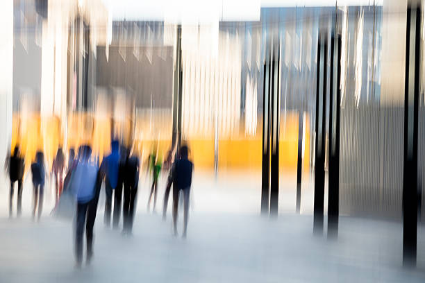 istock Business Commuters Walking in Financial District 614859282