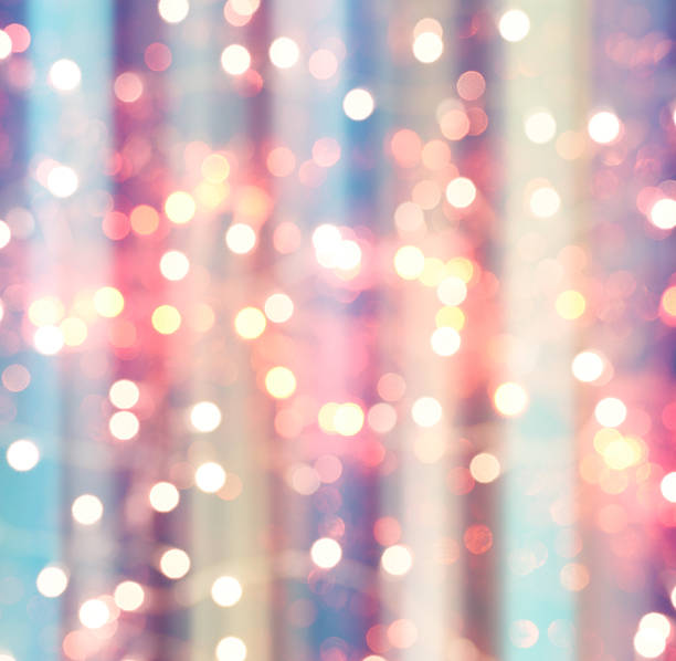 istock colorful abstract background blur motion with bokeh light 614863236