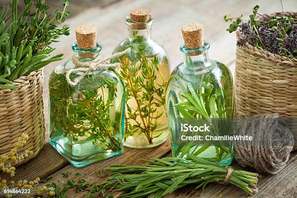 Thyme And Rosemary Essential Oil Or Infusion Stock Photo - Download Image Now - Herbal Medicine, Herb, Essential Oil