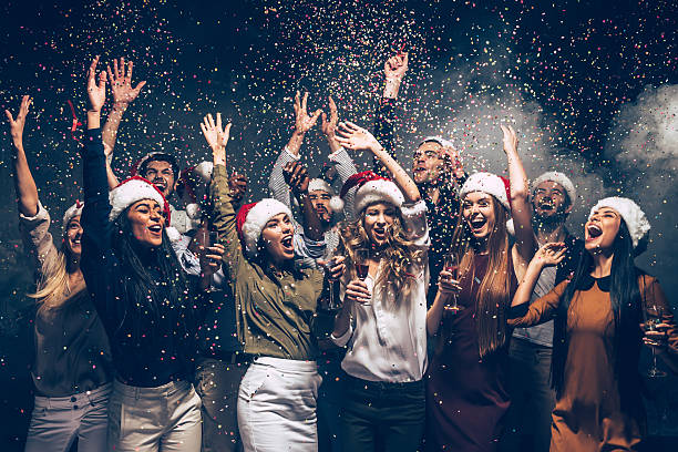 celebrando año nuevo juntos. - celebration event performance performing arts event large group of people fotografías e imágenes de stock