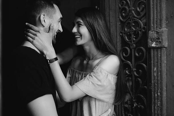 istock couple posing in the doorway 614867600