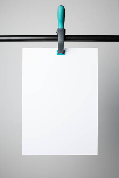 istock Blank poster hanging on A Clamp 614869154