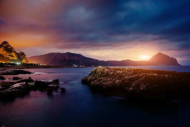 istock city with a night on the beach 614869956