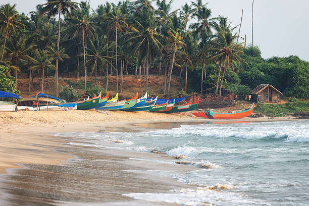 istock Beautiful black beach in Varkala, Kerala, India 614870162