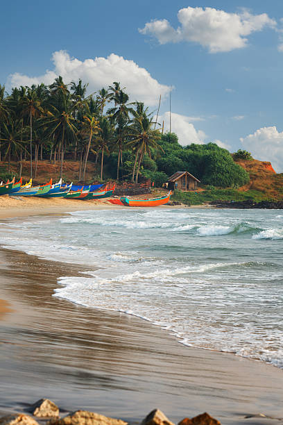 istock Beautiful black beach in Varkala, Kerala, India 614871622